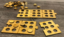 Load image into Gallery viewer, A shot showing 6 braille puzzle pieces. Each piece has 6 cut out slots for little pegs to sit in.

