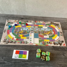 Load image into Gallery viewer, Wide shot of the board with the 3d printed cars, the board overlay, the print dice reference card and the 3d printed replacement dice.
