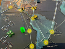 Load image into Gallery viewer, Close up on South America.. Triangle wooden pieces replace the yellow cubes. A replacement player token is also shown.
