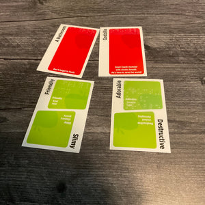 The front of the cards with transparent braille. Any flavor text is not in braille, only the actual word. To view the full text the QR code on the other side is needed.