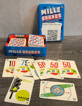 Load image into Gallery viewer, The game with a series of number cards laid out. Drive is in front and the puncture proof card is laid out horizontally indicating that it was used as a bonus.
