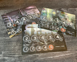 The player boards with tactile overlays on them