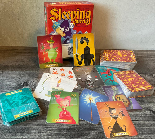 Sleeping queens. All the cards have transparent braille on them. The king cards have braille on the back as well to distinguish them