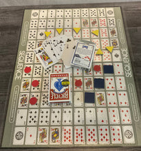 Load image into Gallery viewer, shot of the sequence board with the replacement braille cards. Shaped foam tokens replace the poker chips.
