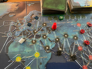 A shot of Europe with it's blue wooden pieces. A red piece is shown on the board.