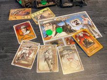 Load image into Gallery viewer, A shot of Ghost&#39;s player cards and player mat.
