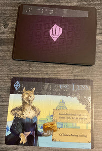 Clan cards. The color and card type is in braille on the back of the card and the animal and it's ability is on the front of the cards