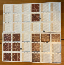 Load image into Gallery viewer, The thermoformed Tsuro replacement board setup . 3d printed pieces are in the slots along the board following the paths
