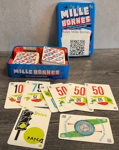 The game with a series of number cards laid out. Drive is in front and the puncture proof card is laid out horizontally indicating that it was used as a bonus.