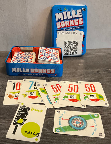 The game with a series of number cards laid out. Drive is in front and the puncture proof card is laid out horizontally indicating that it was used as a bonus.