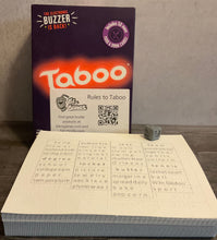 Load image into Gallery viewer, The large print/braille replacement cards along with the game changer that is included in some versions of Taboo.
