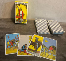 Load image into Gallery viewer, The tarot deck. 4 cards are laid out in front. The back of the cards have a QR code which links to the Wikipedia article on that particular card.

