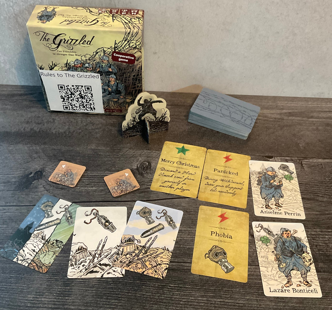 The grizzled with the different types of cards laid out in front of it.