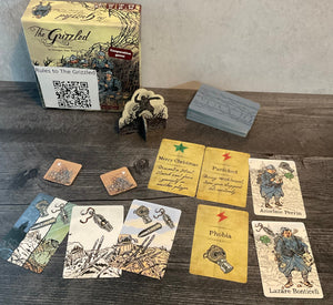 The grizzled with the different types of cards laid out in front of it.