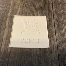 Load image into Gallery viewer, Stingray card with braille and tactile picture.
