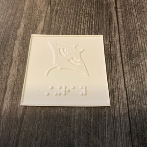 Stingray card with braille and tactile picture.