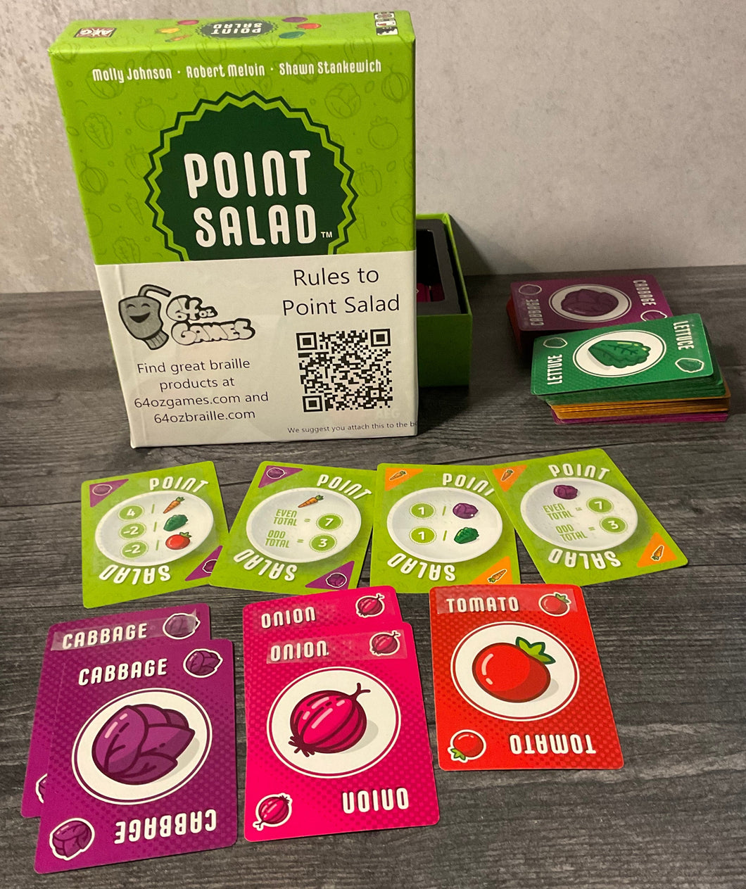Point Salad in braille showing the fronts and backs of some cards