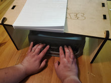 Load image into Gallery viewer, Picture of braille table above the brailler
