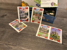 Load image into Gallery viewer, face up cards with houses and numbers on them. All cards have braille stickers on them.
